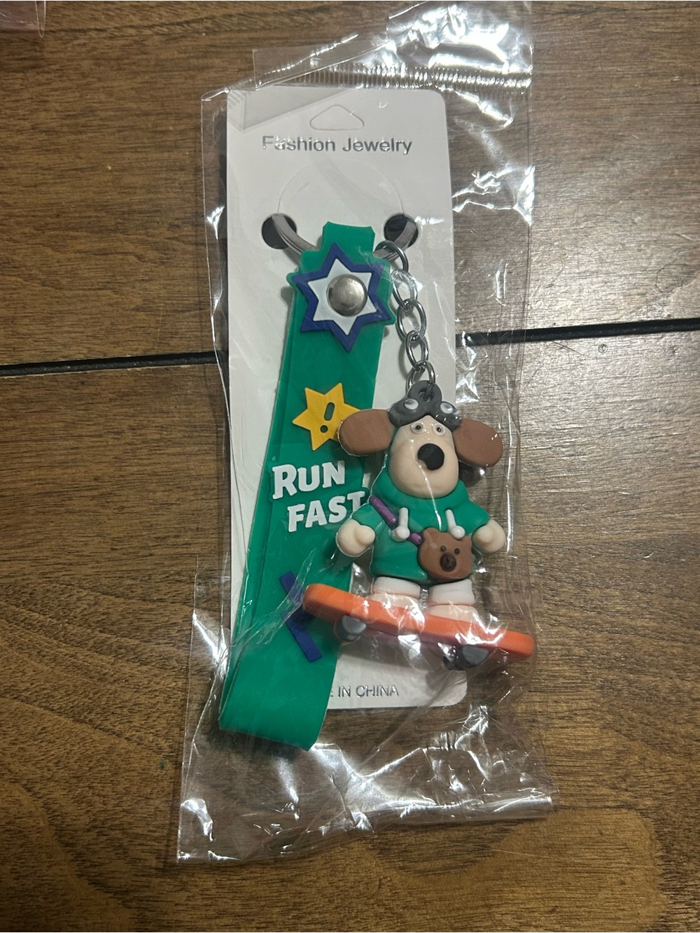 Cute Dog Skateboard Keychain - Green Strap